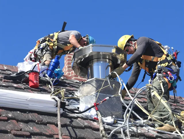 Protective chimney cap installed by Granby Chimney Sweep in Granby, CT