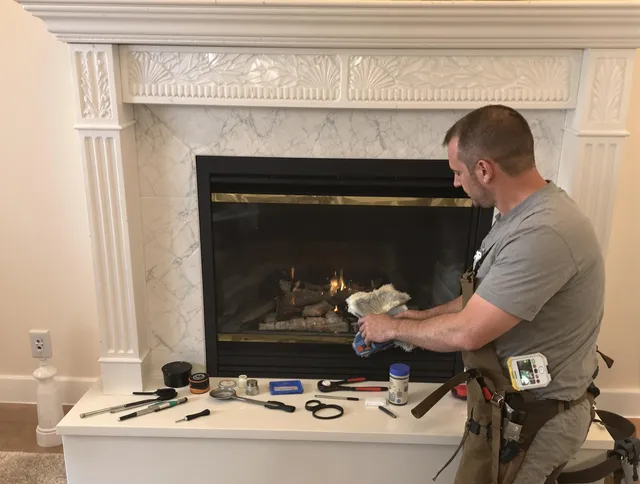 Granby Chimney Sweep performing fireplace maintenance in Granby, CT